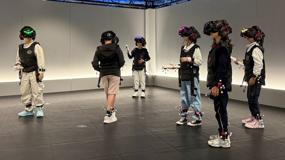 Campus X students trying VR during visit
